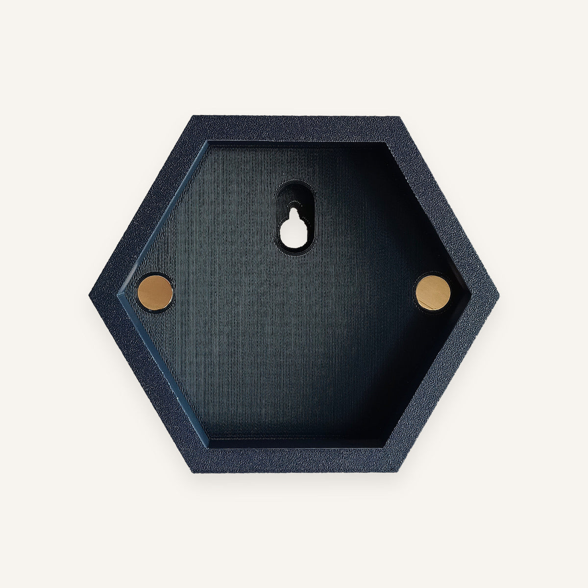 Inside of a Navy backpiece showing the keyhole and two magnets