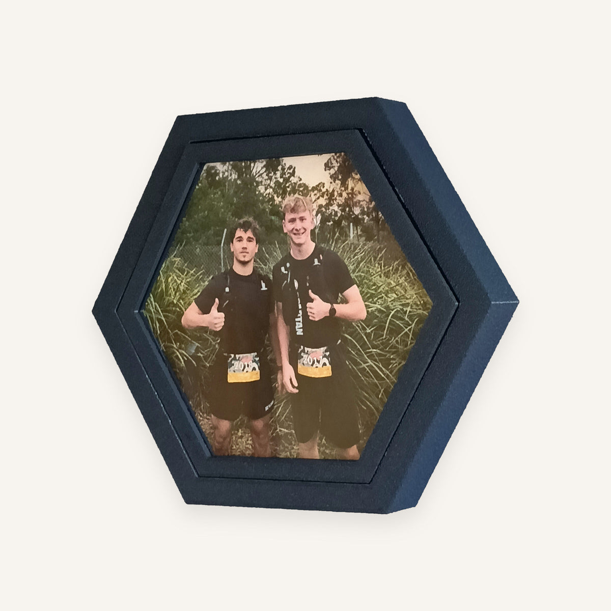 The Photo Tile from the set: a printed race photograph in a Navy frame